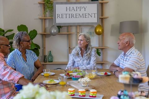 Cheerful Seniors Celebrate Retirement with Joyful Gathering