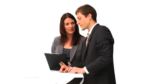 Professional Colleagues Discussing Business Strategies at Meeting