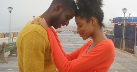 Romantic african american couple sharing tender intimate moment