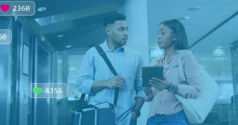 Business Coworkers Using Technology to Monitor Social Engagement