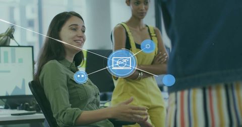 Diverse Business Team Discussing Network Connectivity Icons