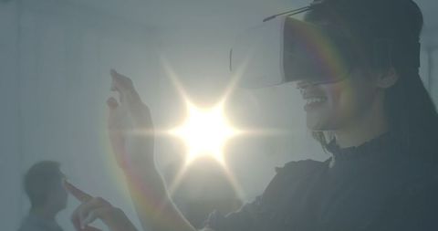 Woman Engaged with Virtual Reality in Futuristic Environment