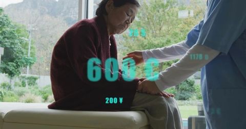 Caregiver comforting senior woman on window bench with teal health data overlays, daylight