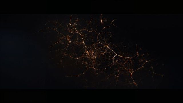 Glowing Amber Network Spreading Through Dark Digital Space