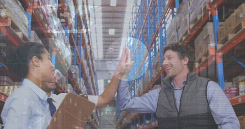 Business Team Celebrating Success in Modern Warehouse - Download Free Stock Images Pikwizard.com
