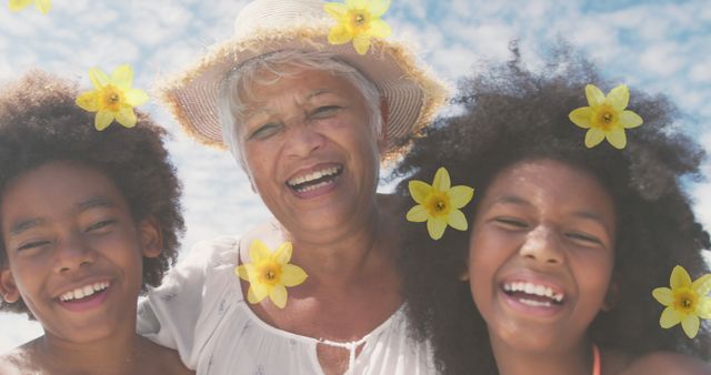 Happy Grandmother and Grandchildren with Flower Effects on Beach - Download Free Stock Images Pikwizard.com