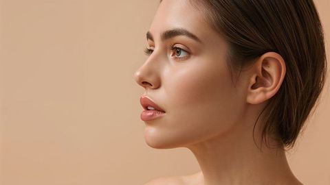 Elegant beautiful lady model emphasizing natural skincare in minimalistic contrast