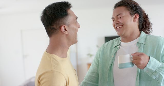 Two Smiling Friends Enjoying Coffee Together Indoors - Download Free Stock Images Pikwizard.com