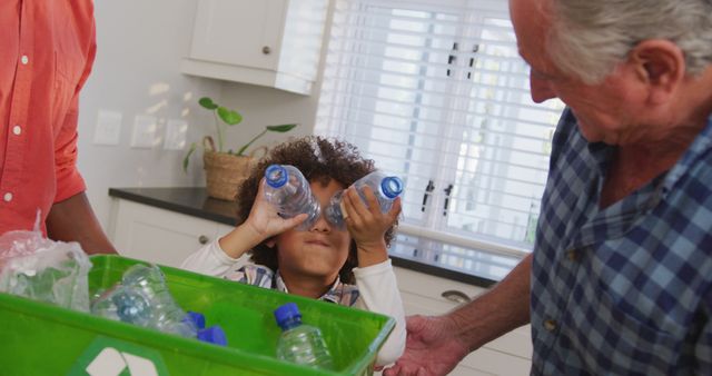 Highlighted young boy playing with plastic bottles while his grandfather watches. Demonstrates family involvement in recycling activities at home. Perfect for illustrating environmental education, sustainable living, family bonding, and home responsibilities.