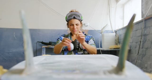 Female Carpenter Working Meticulously in a Workshop - Download Free Stock Images Pikwizard.com