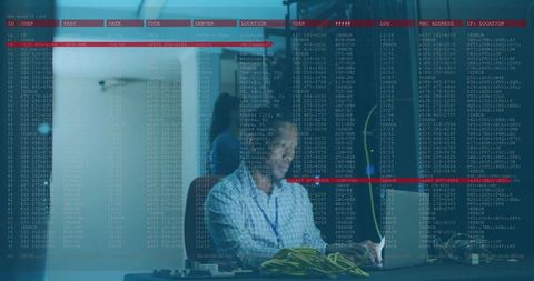 It technician configuring server room network infrastructure
