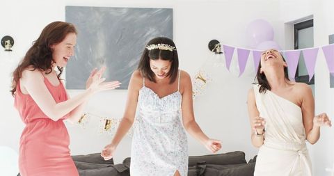 Diverse Female Friends Enjoying a Birthday Celebration at Home