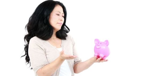 Thoughtful asian woman evaluating financial savings
