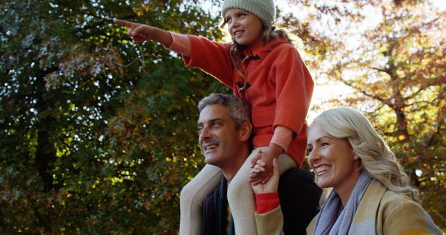 Joyful Family Enjoying an Autumn Day Outdoors - Download Free Stock Images Pikwizard.com