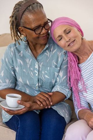 Senior Women Sharing Emotional Moments of Friendship Together