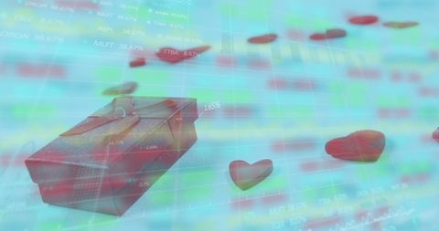 Gift box and hearts over stock market charts