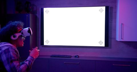 Man Embracing Virtual Reality Gaming Experience at Home