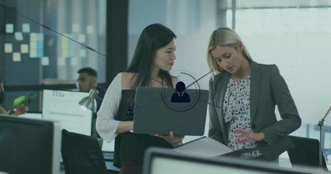 Diverse Businesswomen Collaborating with Technology Concept