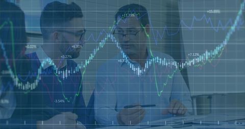 two businessmen analyzing stock market data in modern office - Download Free Stock Images Pikwizard.com