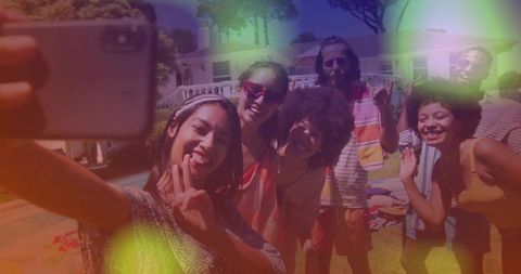 Joyful Friends Taking Selfie at Luxurious Pool Promoting Summer Fun