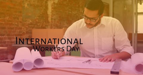 Architect Drafting Plans for International Workers Day - Download Free Stock Images Pikwizard.com