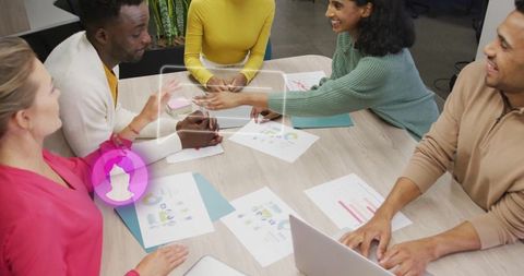 Corporate Team Collaborating on Innovative Project in Modern Office