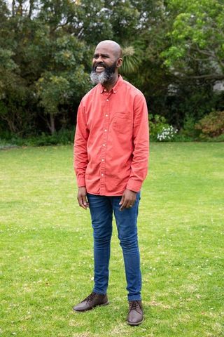 Senior African American Man Standing in Garden, Enjoying Nature