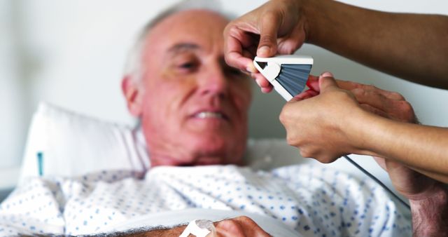 Elderly Patient Receiving Medical Care in Hospital Bed - Download Free Stock Images Pikwizard.com