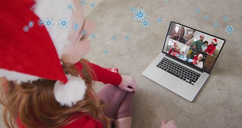 Woman Celebrating Virtual Christmas Call with Family