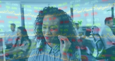 Businesswoman Analyzing Stock Market Data on Transparent Screen