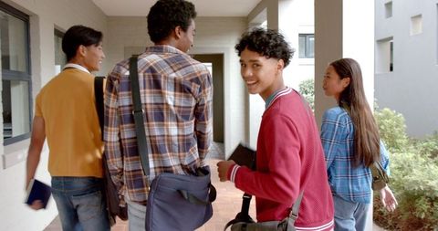 Happy Students Walking Together in School Corridor Laughing - Download Free Stock Images Pikwizard.com