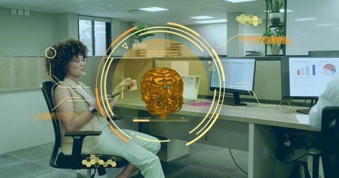 Woman Interacting with Holographic Skull in Modern Office Setting