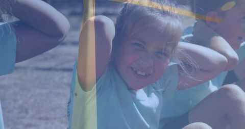 Kids Exercising at Outdoor Sports Field in Blue Activewear