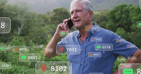 Senior Man Using Smartphone Outdoors with Technological Elements Overlay
