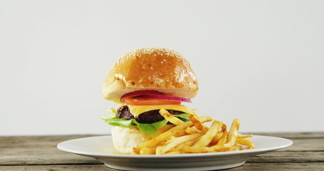Close-up of hamburger and french fries in plate