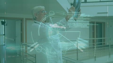 Senior Doctor Analyzing Digital X-Ray Interface in Modern Hospital