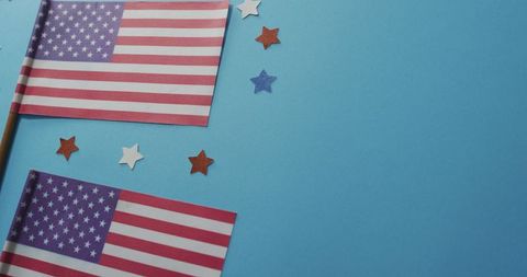 American Flags and Stars on Blue Background for Patriotic Celebration