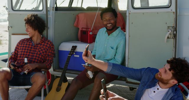 Friends Enjoying Beach Road Trip with Drinks and Guitar - Download Free Stock Images Pikwizard.com