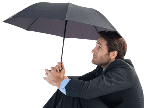 Businessman Sitting with Transparent Umbrella
