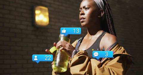 Social Media Notifications Over Fitness Enthusiast Staying Hydrated