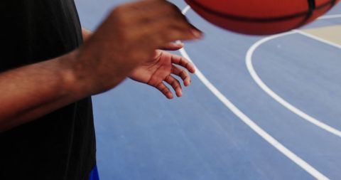 Basketball Player Practicing Dribbling on Outdoor Court