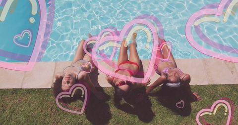 Women Relaxing by Pool with Heart Overlays on Sunny Day