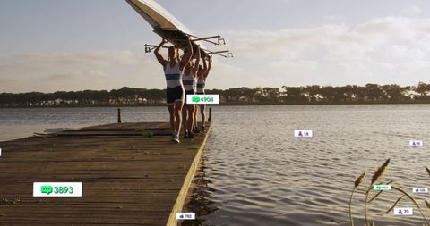 Rowers Carrying Shell on Dock at Sunset with Digital Icons Overlay