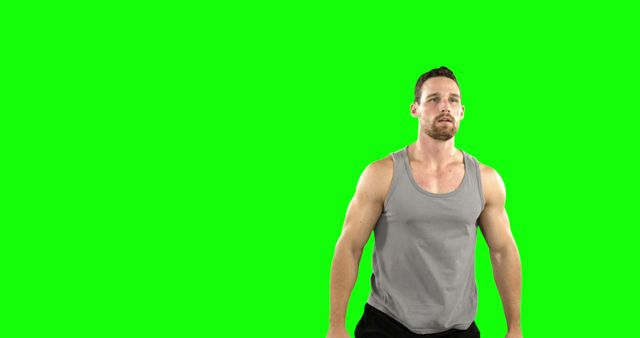 Player playing basketball against green screen
