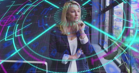 Businesswoman Analyzing Data with Futuristic Holographic Overlay - Download Free Stock Images Pikwizard.com