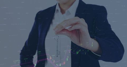 Real estate agent holding key with digital financial data overlay