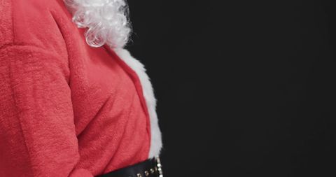 Close-up of Santa Claus Suit Evoking Holiday Spirit