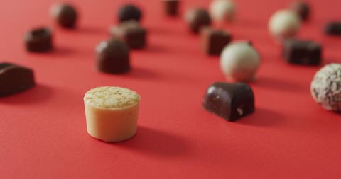 Assorted Swiss Chocolates on Red Background for Valentine's Day - Download Free Stock Images Pikwizard.com