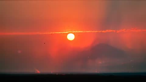 Vibrant Sunset Timelapse Illuminating Horizon