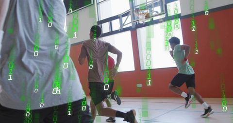 Sprinting basketball players performing indoor court drill with green data stream overlay